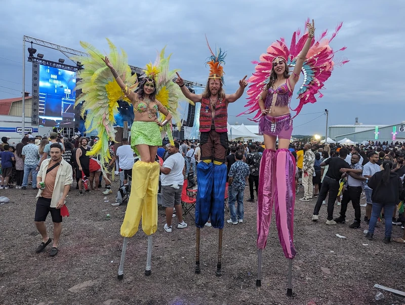 Carribeal Carnival Stilts - Stiltwalker - Feathers theme - image 9