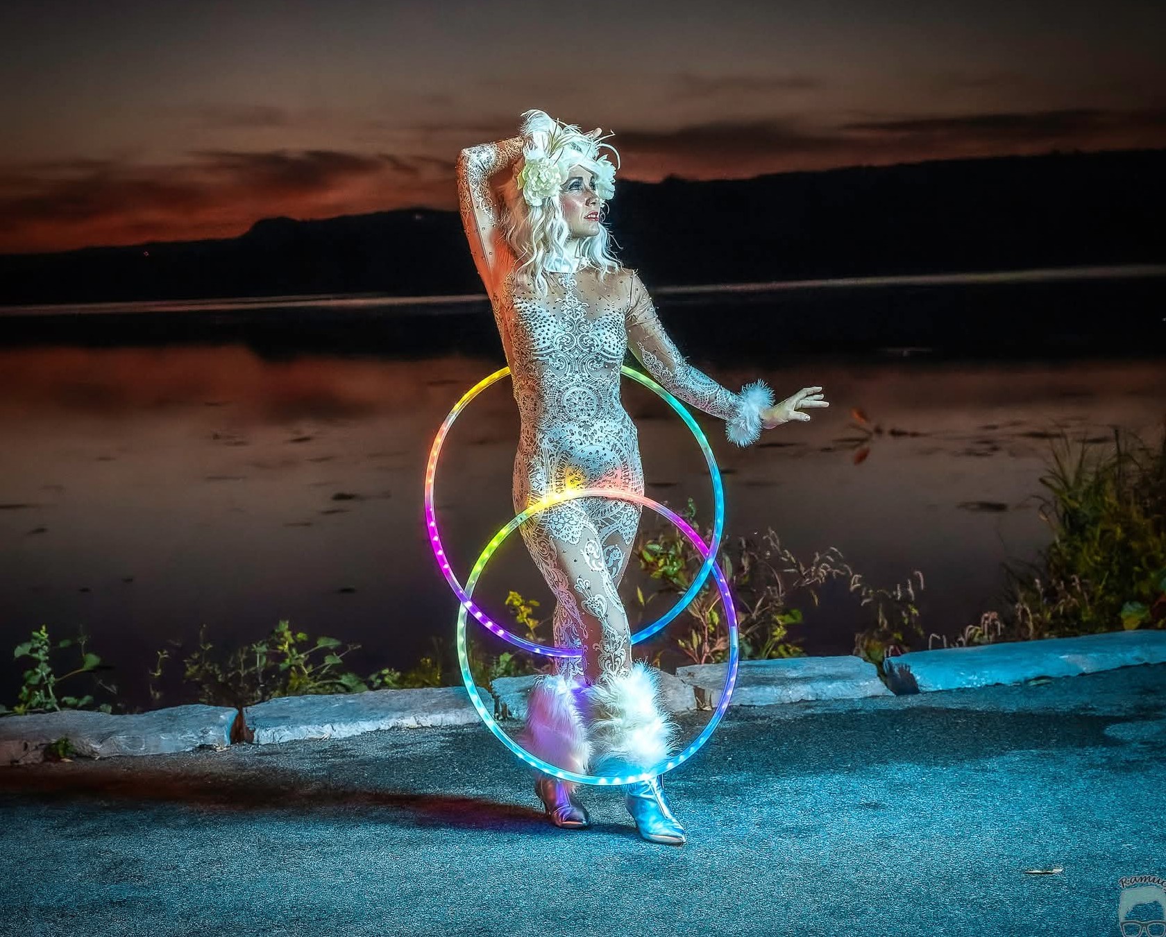 Hire event performers Toronto Hala circus Arts Hala on stilts Entertainment Sparkle flow hooper and LED