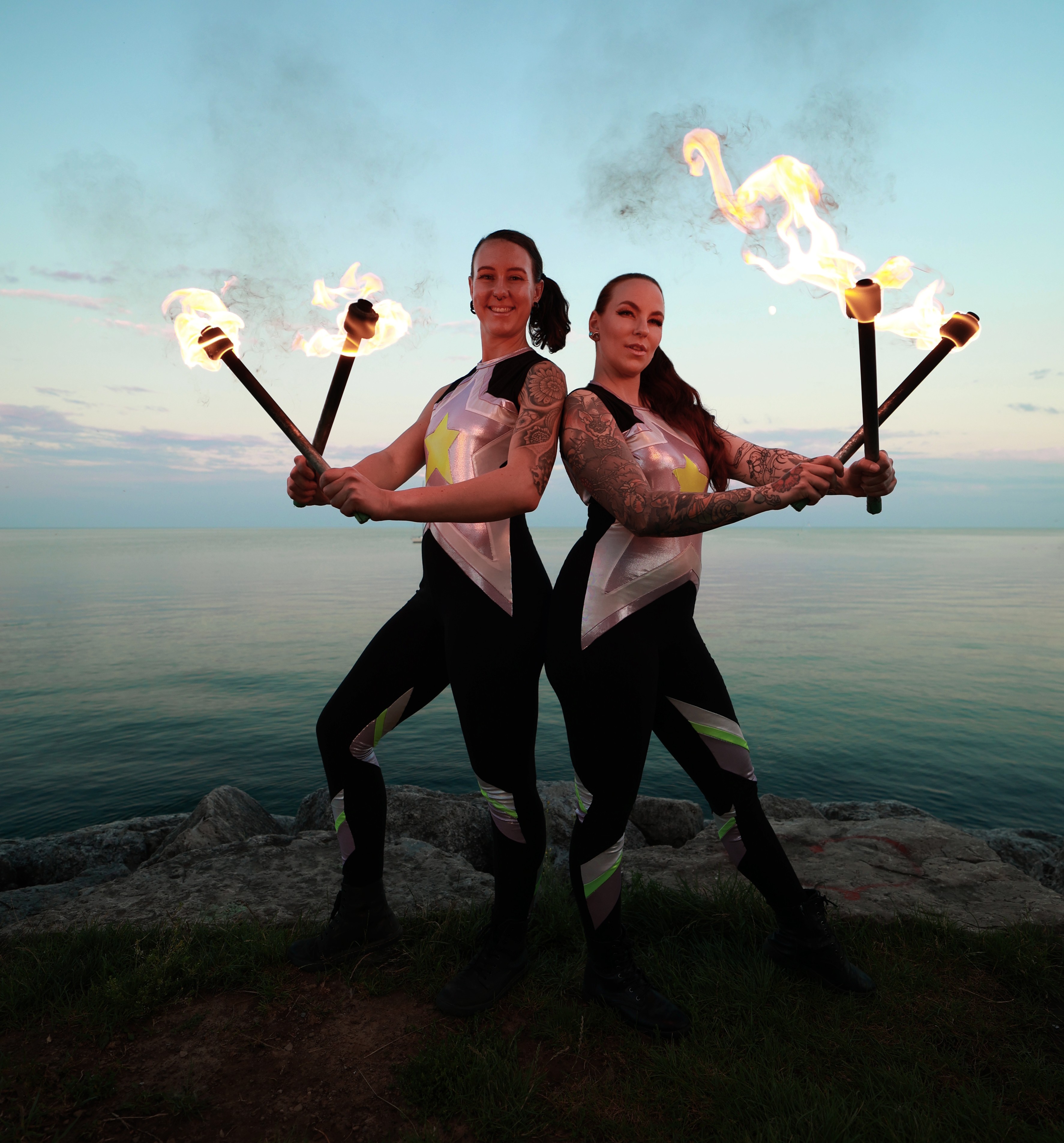 Hire fire performers Toronto Ontario Hala circus arts Fire in Motion duo show