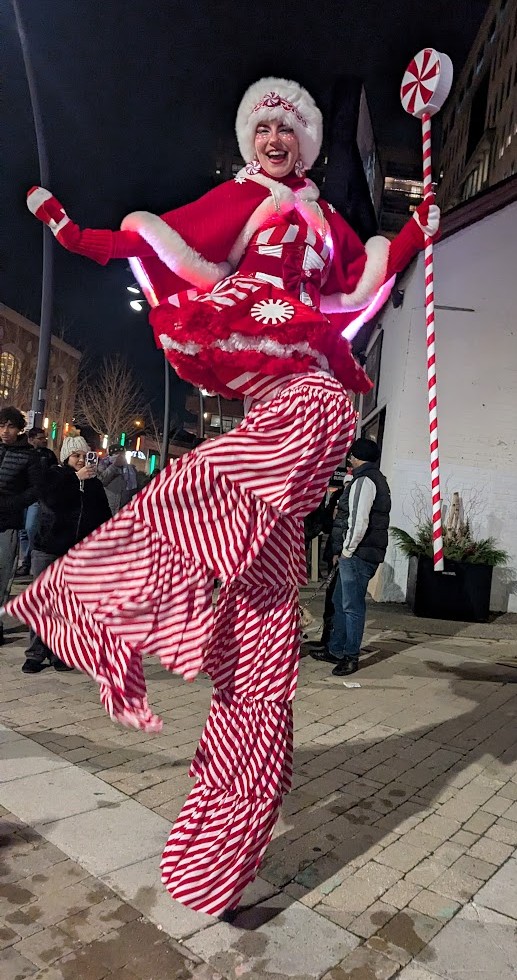 Hire circus event performers Toronto Hala on Stilts Entertainment Pepperminttina christmas peppermint stiltwalker
